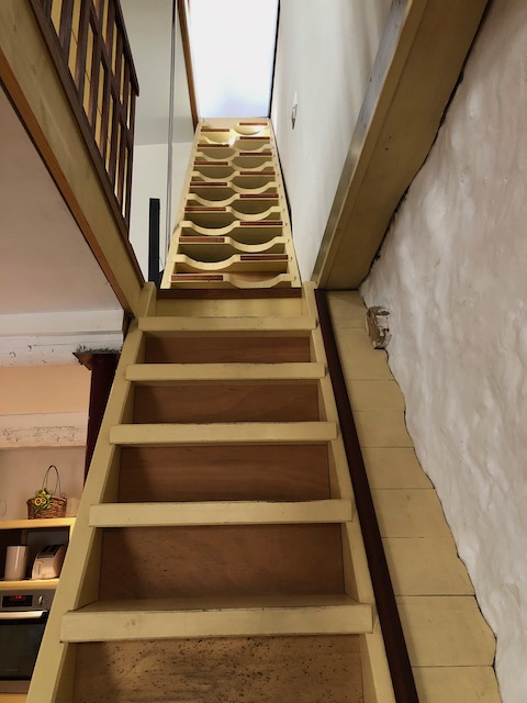 A narrow French staircase