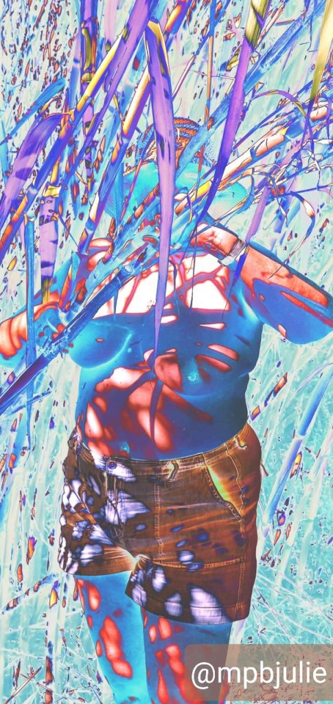 I'm topless in the bushes. But the image has been altered so the bamboo is blue and purple and my body is blue and brown. I'm somehow more hidden. 